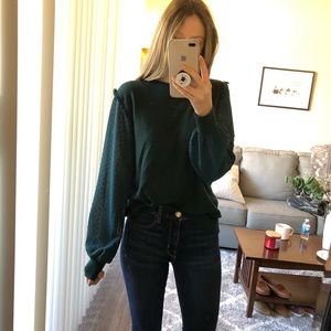 Teal sweater with sheer blouse sleeves